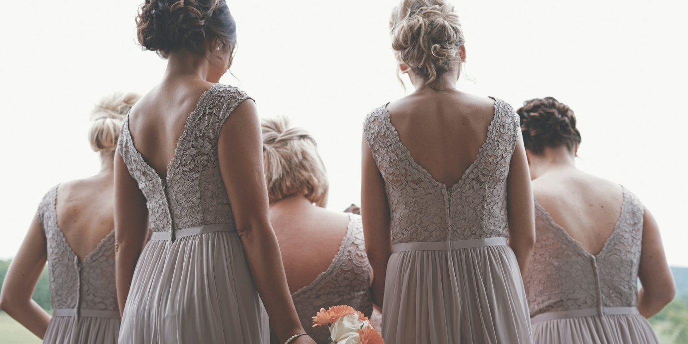 bridesmaids standing together.