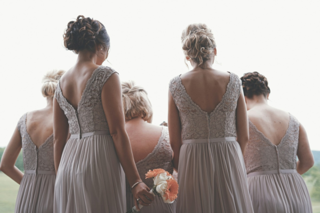 bridesmaids standing together.