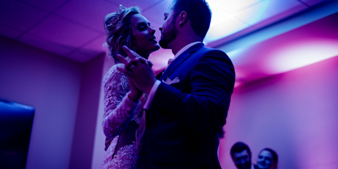 a bride and groom dancing