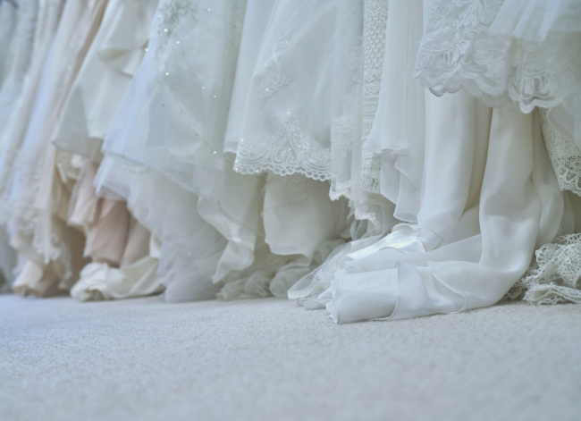 white wedding gowns next to each other